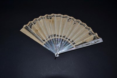 Lot 5048 - An Early 20th Century White Mother-of-Pearl Fan, the leaf with cream background net, overlaid...