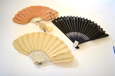 Lot 5061 - A 1920's Paper Fan in Palmette or Jenny Lind form, the panels a pale salmon, with a white paper...