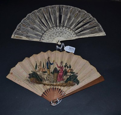 Lot 5070 - A 19th Century Bone Fan, the monture carved and pierced and clouté in silver. The leaf of...