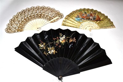 Lot 5073 - A 19th Century Jenny Lind or Palmette Fan, heavily decorated in gold on cream découpé panels,...