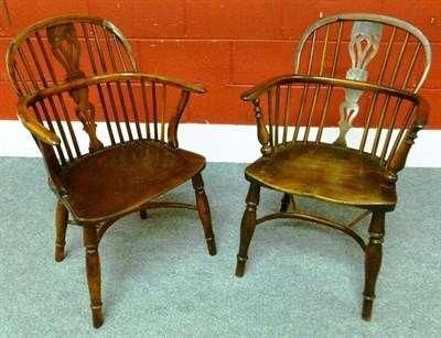 Lot 1289 - A Mid 19th Century Yewwood Windsor Armchair, the double row spindle back support above turned...