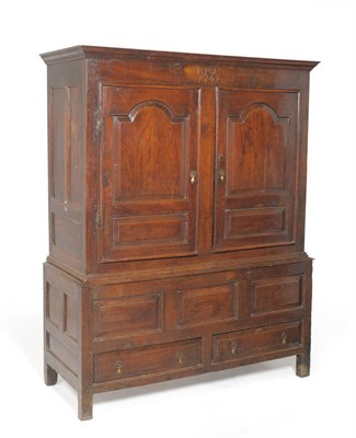 Lot 1291 - A Mid 18th Century Joined Oak Press Cupboard, carved  RT and GE, dated 1749, with two fielded panel