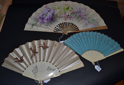 Lot 5095 - An Attractive, Large 1890's Cream Gauze Fan painted with branches of lilac blossom in shades of...