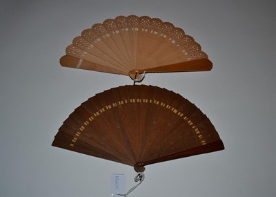 Lot 5106 - A Late 19th Century Dark Wood Brisé Fan, the guards varnished, painted centrally with the...