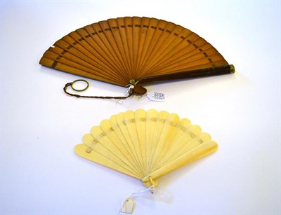 Lot 5107 - Nelly: A Large Late 19th Century Wood Brisé Fan, the rounded guards both stained a deeper...