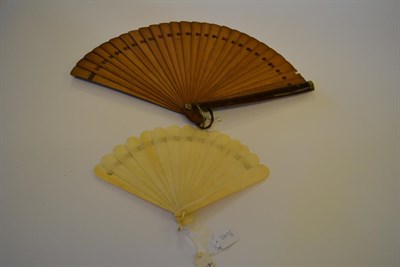 Lot 5107 - Nelly: A Large Late 19th Century Wood Brisé Fan, the rounded guards both stained a deeper...