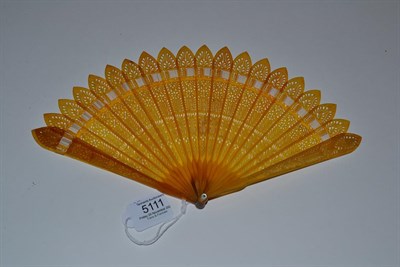 Lot 5111 - A Circa 1830's Horn Brisé Fan with pointed tips, the two guards and nineteen inner sticks...