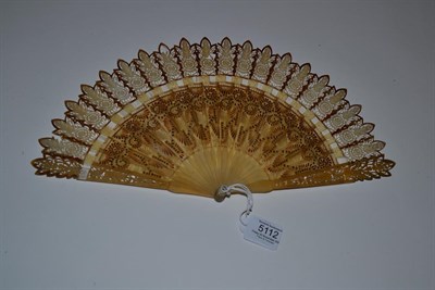 Lot 5112 - A Good Early 19th Century Gothic Pale Horn Brisé Fan, carved, pierced and gilded, the tips...