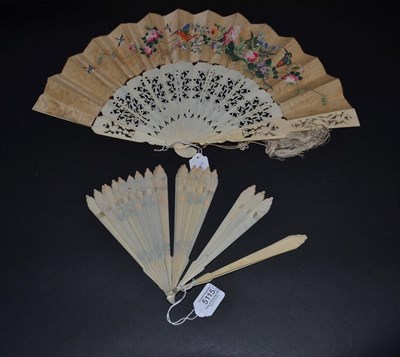 Lot 5115 - An Early 19th Century Ivory Brisé Fan, the gothic stick tips painted gold, beneath which are...