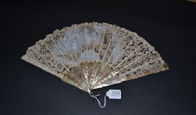 Lot 5128 - An Unusual Pale Pink Mother-of-Pearl Fan, dated 21.8.1911, mounted with a mixed Brussels lace leaf