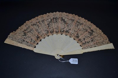 Lot 5132 - A Late 19th Century Brussels Point De Gaze Fan, the monture of bone carved on the guards and...