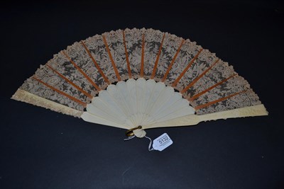 Lot 5132 - A Late 19th Century Brussels Point De Gaze Fan, the monture of bone carved on the guards and...