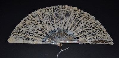 Lot 5135 - An Attractive Floral Black Lace Fan, most likely Chantilly, circa 1900, the leaf incorporating...
