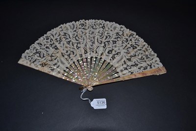 Lot 5136 - Ghent Valenciennes, A Very Fine Handmade Bobbin Lace Leaf, circa 1900, mounted on plain pink...