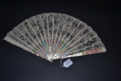 Lot 5137 - A Late 19th Century Medium Size Brussels Point De Gaze Needle Lace Fan, the monture of a bright and