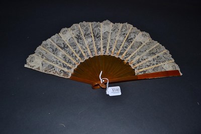 Lot 5140 - An Attractive Late 19th Century Brussels Point De Gaze Needle Lace Fan, the lace leaf mounted...