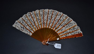 Lot 5142 - Bearing a Leaf of 19th Century Point de Venise Needle Lace, this circa 1900 fan, the monture of...