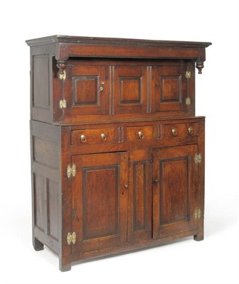 Lot 1296 - A Mid 18th Century Joined Oak Press Cupboard, probably North Wales, the plain frieze with...