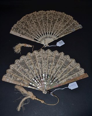 Lot 5147 - Two Early 20th Century Lace Fans, the first of plain pink mother-of-pearl, bone ribs supporting...