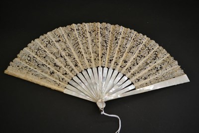 Lot 5156 - A Good Late 19th Century Brussels Bobbin Lace Fan, the guipure lace mounted on a sturdy white...