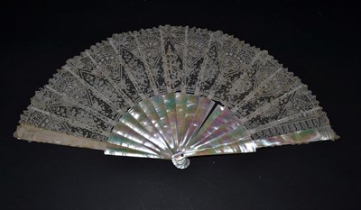 Lot 5165 - A Good Late 19th Century Brussels Needle Lace Fan Leaf with geometric design, mounted on...