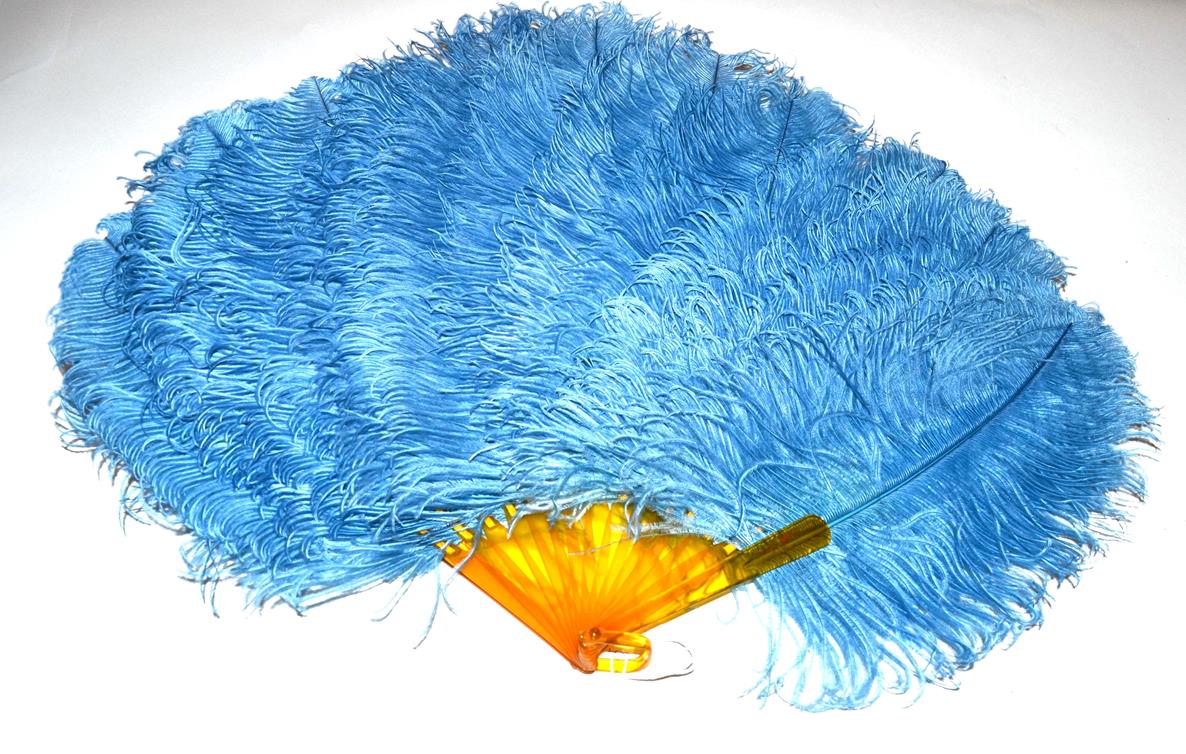 Lot 5176 - An Attractive Mid-Blue Ostrich Feather Fan, the monture of simulated blonde tortoiseshell, the...