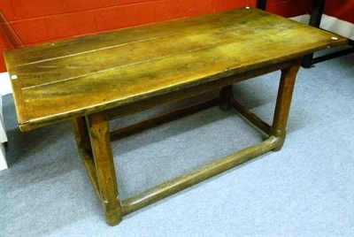 Lot 1300 - A Joined Oak Refectory Table, basically 17th century, the rectangular three-plank top with...