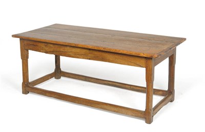 Lot 1301 - An 18th Century Joined Elm Refectory Table, the rectangular top of three plank construction...