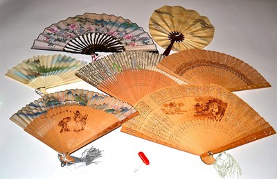 Lot 5205 - A Selection of Interesting 20th Century Chinese and Japanese Fans, starting with a wood example...