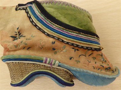 Lot 5217 - Two Embroidered Chinese Hats for Children, worked in panels both vertically and horizontally,...