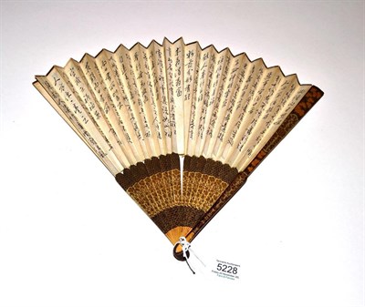 Lot 5228 - A Good Chinese Fan, 19th century, Qing Dynasty, the slender sticks with black lacquer and...