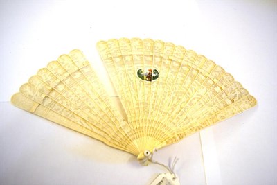 Lot 5232 - A Circa 1840's Chinese Carved Ivory Brisé Fan, Qing Dynasty, the twenty-one inner sticks and...