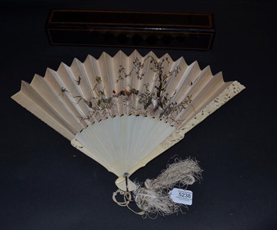 Lot 5238 - A Good Carved Ivory Chinese Fan with finely embroidered cream silk leaf, the gorge sticks...