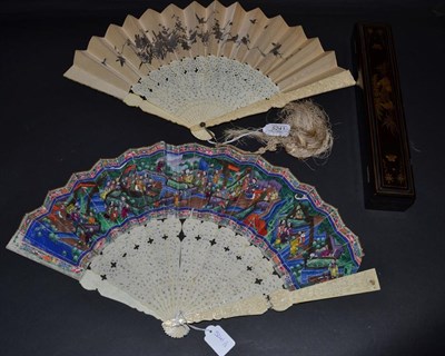 Lot 5241 - A 19th Century Chinese Carved Ivory Mandarin Fan, Qing Dynasty, the guards deeply carved with...