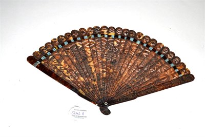 Lot 5242A - A Fine and Slender 19th Century Chinese Carved Tortoiseshell Brisé Fan, the intricate design...