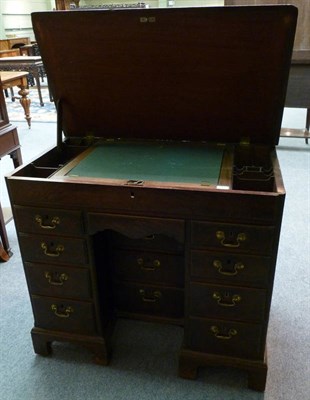 Lot 1308 - A George III Mahogany Kneehole Desk, 3rd quarter 18th century, the hinged top enclosing a...