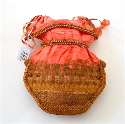 Lot 5265 - A Rare Salmon Pink Silk and Straw Reticule, circa 1860's, the silk taffeta plain, the top with...