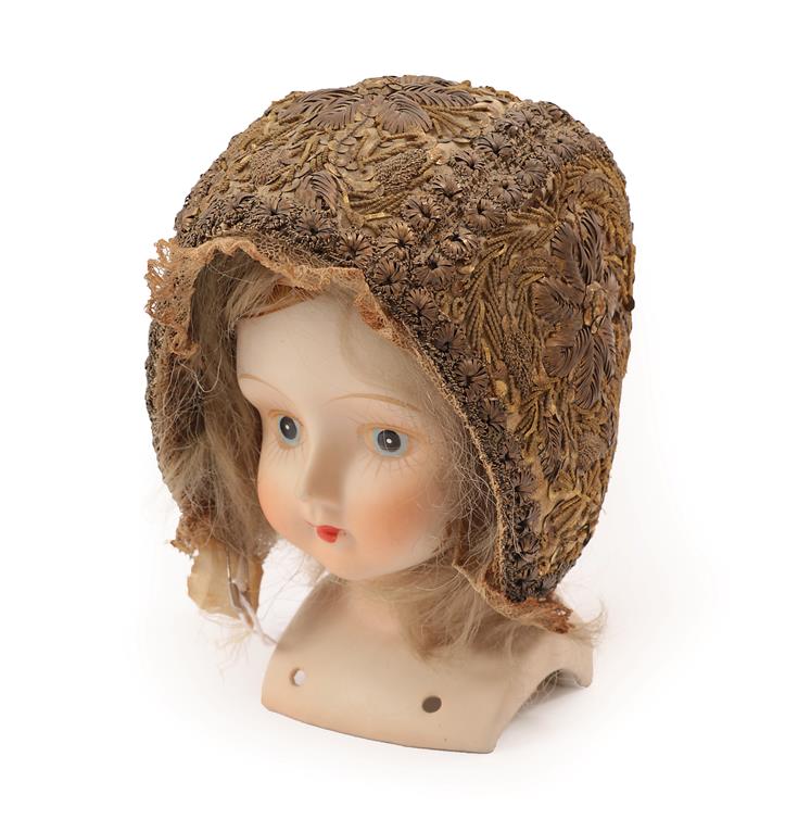 Lot 5269 - An 18th Century European Child's Cap worked in gold threads, and silver coiled thread, edged...
