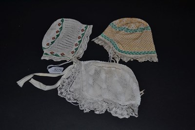 Lot 5276 - Three 19th Century European Knitted Cotton Beaded Caps or Bonnets, the largest in white with...