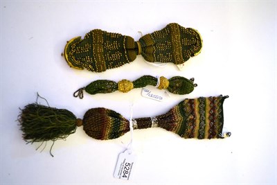 Lot 5284 - A Trio of 19th Century Miser's or Stocking Purses in shades of green gold and silver,...