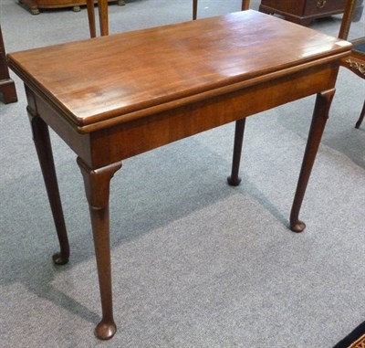 Lot 1315 - A George III Mahogany Concertina Action Foldover Card Table, late 18th century, the hinged lid...