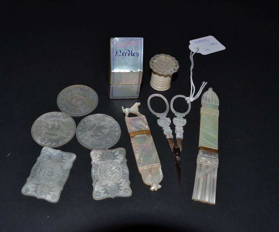 Lot 5335 - Ten Mother-of-Pearl Sewing Items, to include a slender needle holder carved with flowers,...