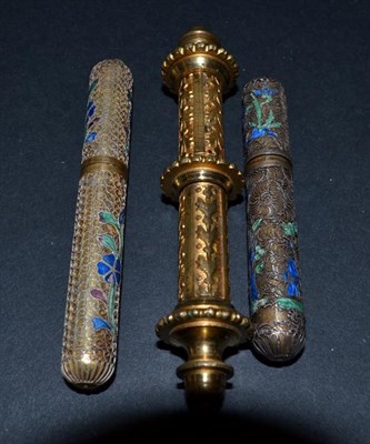 Lot 5338 - Three Gold Metal Needle Cases, two encased in filigree with blue and green enamel detail. The...