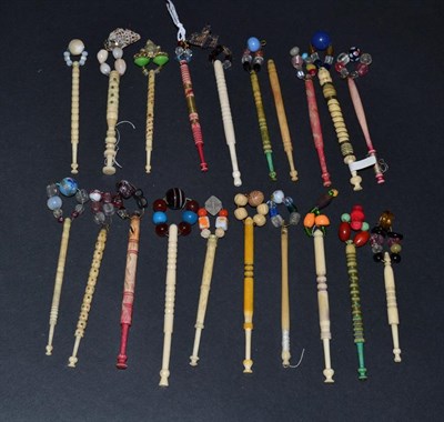 Lot 5345 - A Quantity of Lace Bobbins, with various spangles, a mix of bone and ivory, some stained, some with