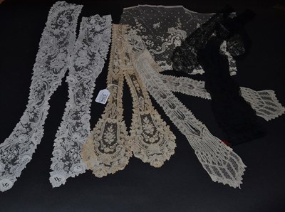 Lot 5354 - Antique Lace, all 19th century: A Brussels Point de Gaze needle lace long, shaped collar, roses...