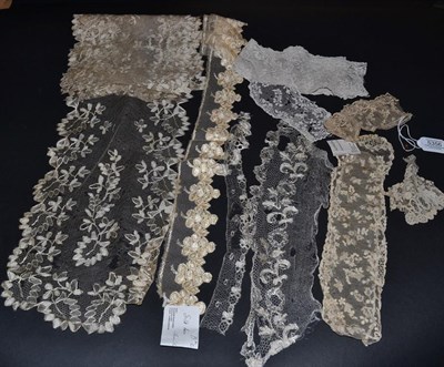 Lot 5356 - Antique Lace, Collector's Fragments: A 19th century silk Blonde lace scarf, approx. 1.66m by...