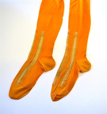 Lot 5378 - A Most Marvellously Vibrant Pair of Mustard Silk Stockings, late 19th century or perhaps the...