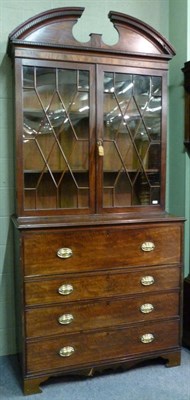 Lot 1333 - A George III Mahogany Secretaire Bookcase, circa 1800, the broken arched pediment above a...