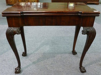 Lot 1336 - A Mahogany Chippendale Style Card Table, of inverted breakfront form, the hinged leaf enclosing...