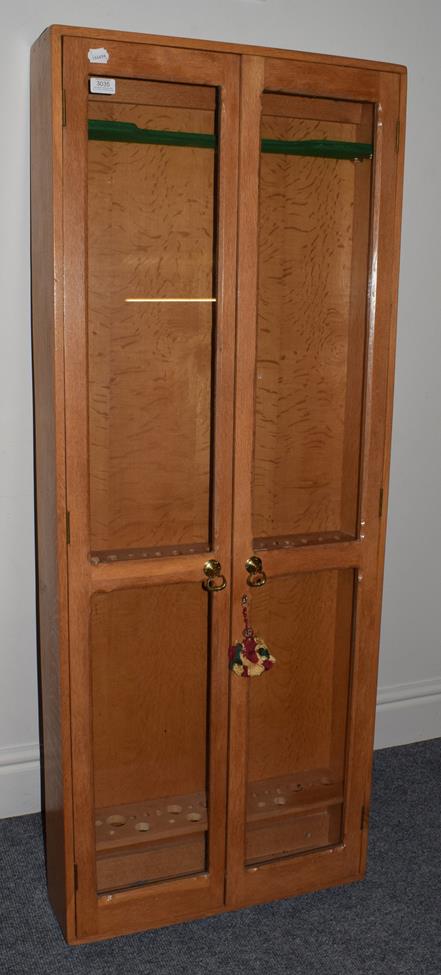 Lot 3035 - A Custom Built Sportsman's Cabinet in oak with glazed doors and fitted internally for rod...